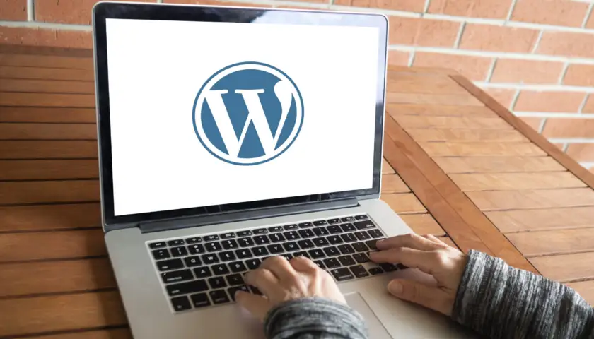 WordPress logo on macbook screen